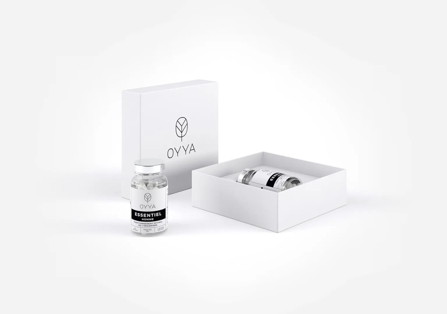 Coffret Oyya Essentiel Homme avec flacon de compléments alimentaires et packaging premium minimaliste blanc.